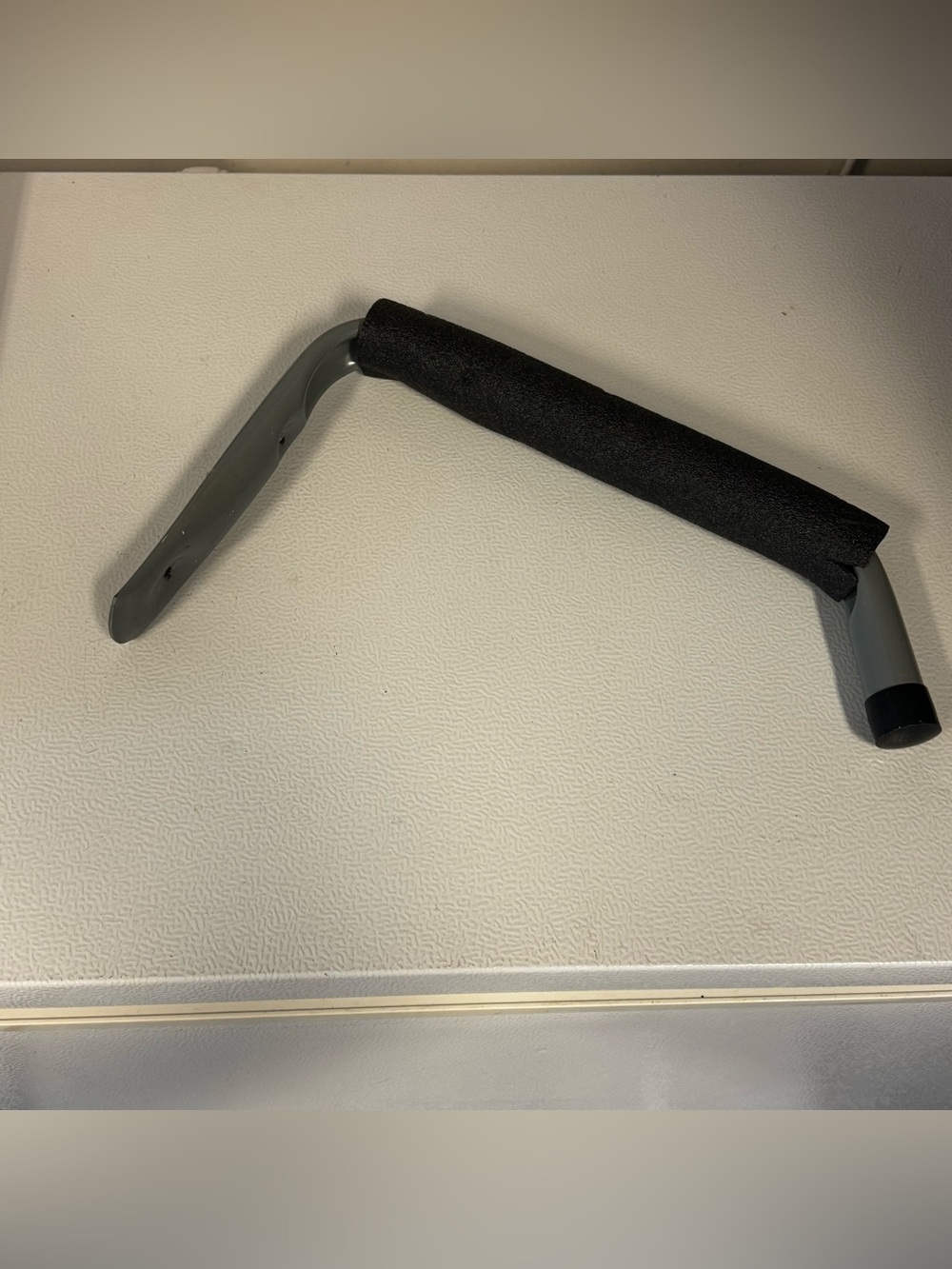 Black Foam-Padded Closet Handle for Easy Grip and Organization